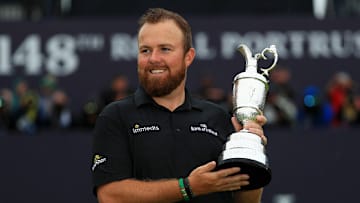 Shane Lowry poses with the trophy after winning the 148th Open Championship.